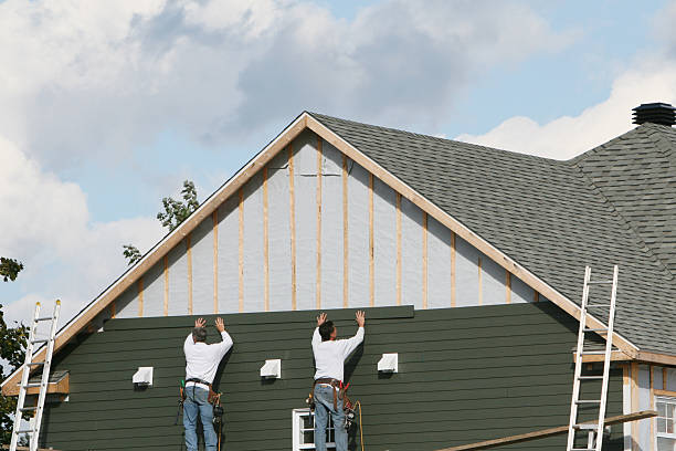 Professional Siding Replacement technician working in Robbins, NC